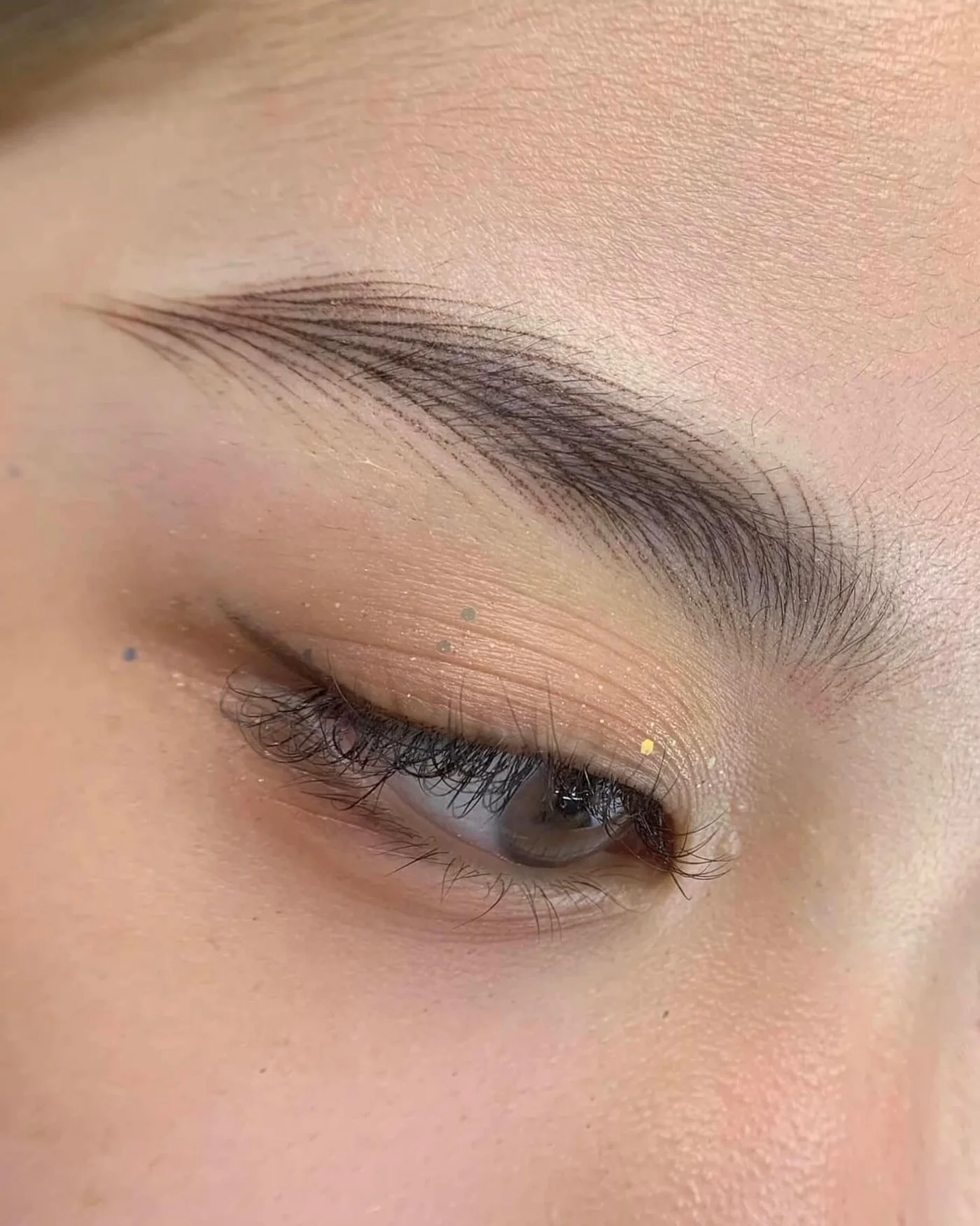 Softly defined permanent makeup eyebrow