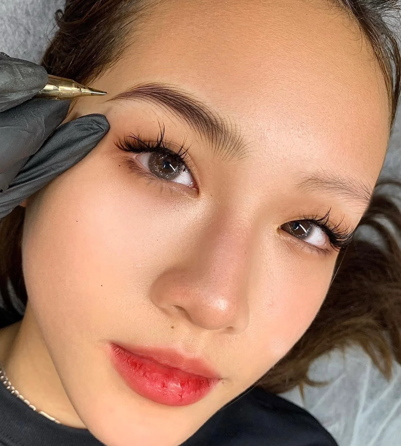 Client result showing balanced brows and lip color