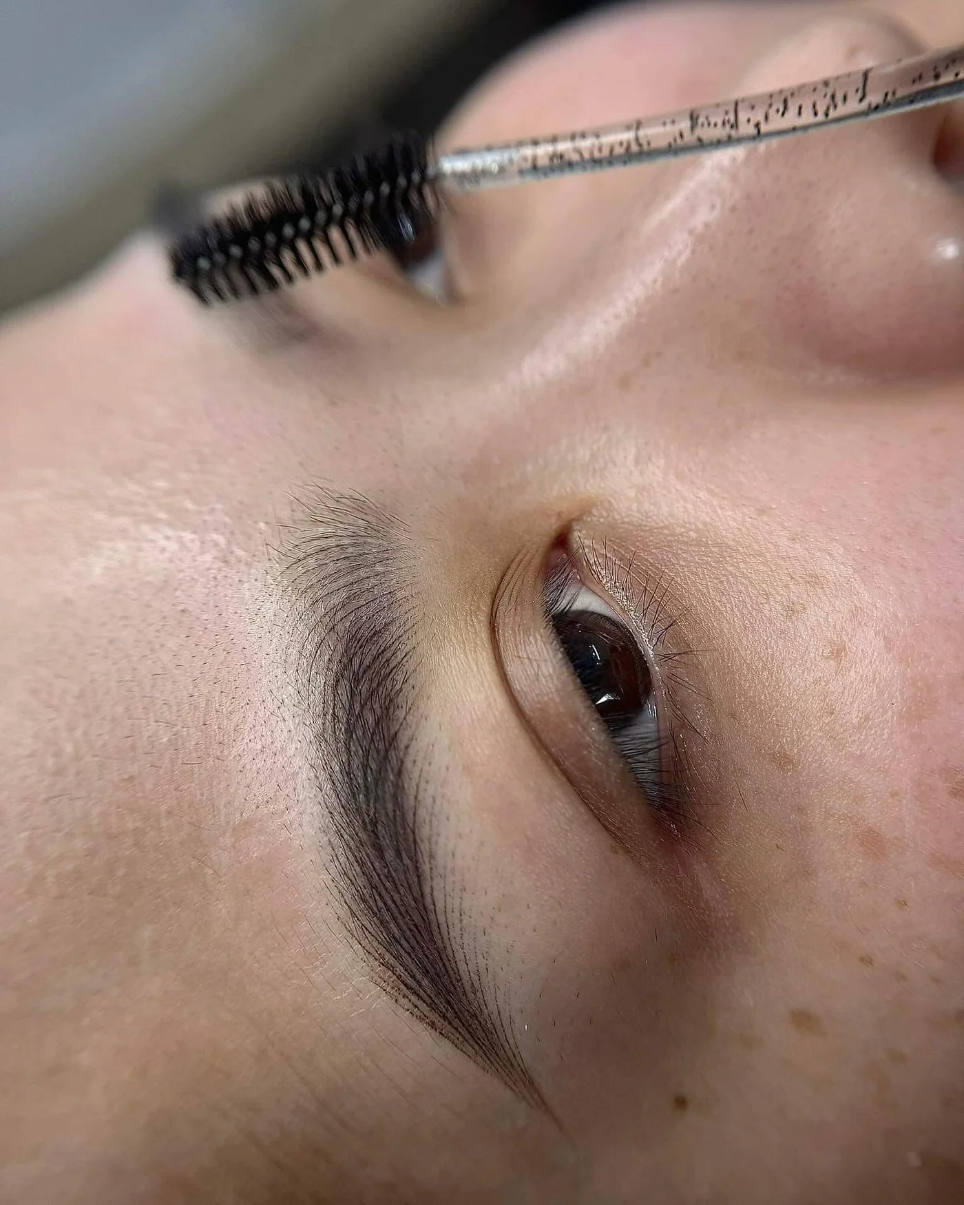 Permanent brow detailing during a client appointment