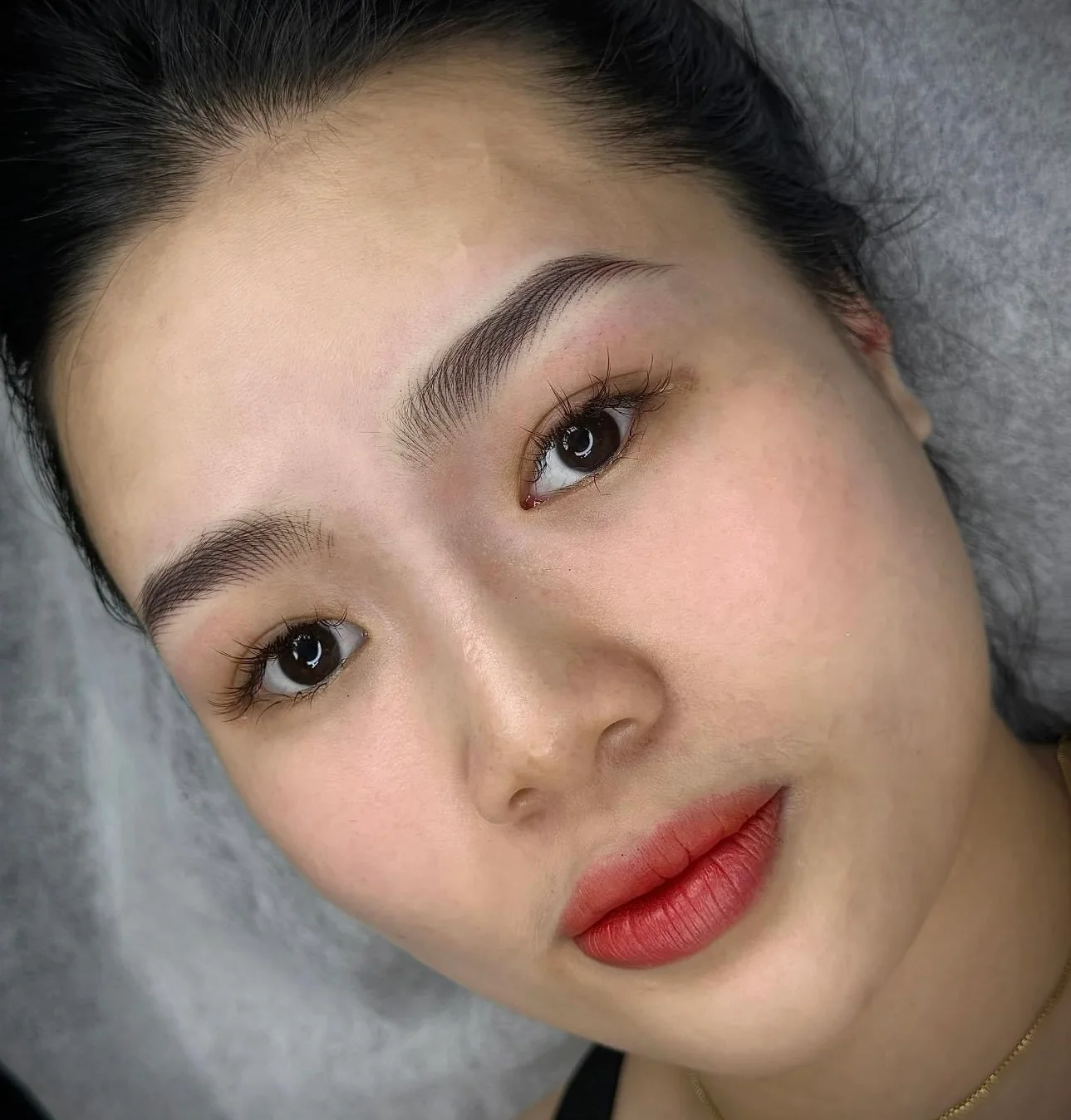 Finished permanent makeup brows on a client